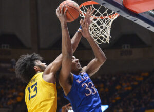 No. 6 Kansas dominates inside to hold off WVU rally for a 71-58 victory